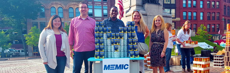 MEMIC employees participating in United Way food can drive
