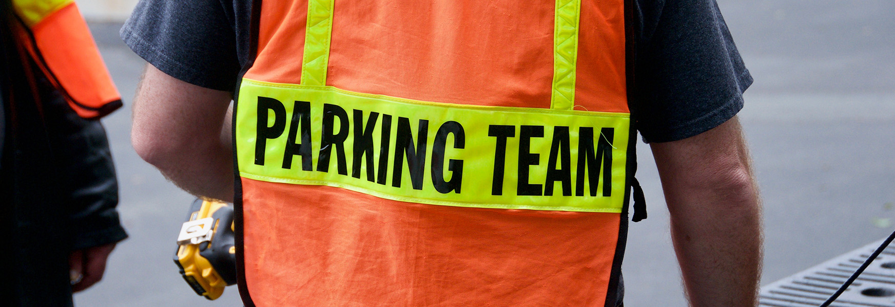 Parking worker wearing high viz vest