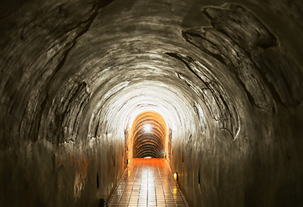 Confined space of a dimly lit underground tunnel