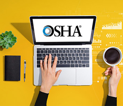 Open laptop with OSHA logo visible on screen